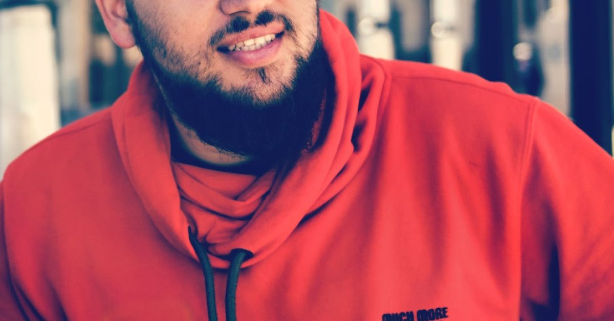 Inspirational quotes on a stylish sweatshirt for motivation.